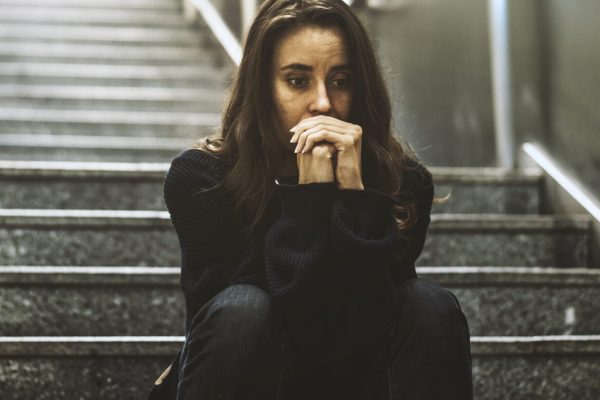 Woman Sitting Look Worried on The Stairway